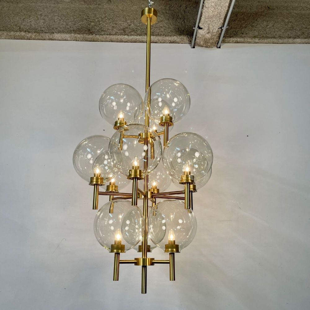 Pair of Monumental Mid-Century Modern Style Chandeliers in Amber Glass and Brass