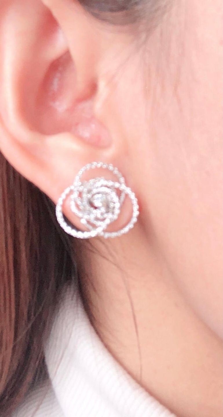 18 Karat White Gold Diamond Flower Swirl Stud Earrings by H2 at Hammerman