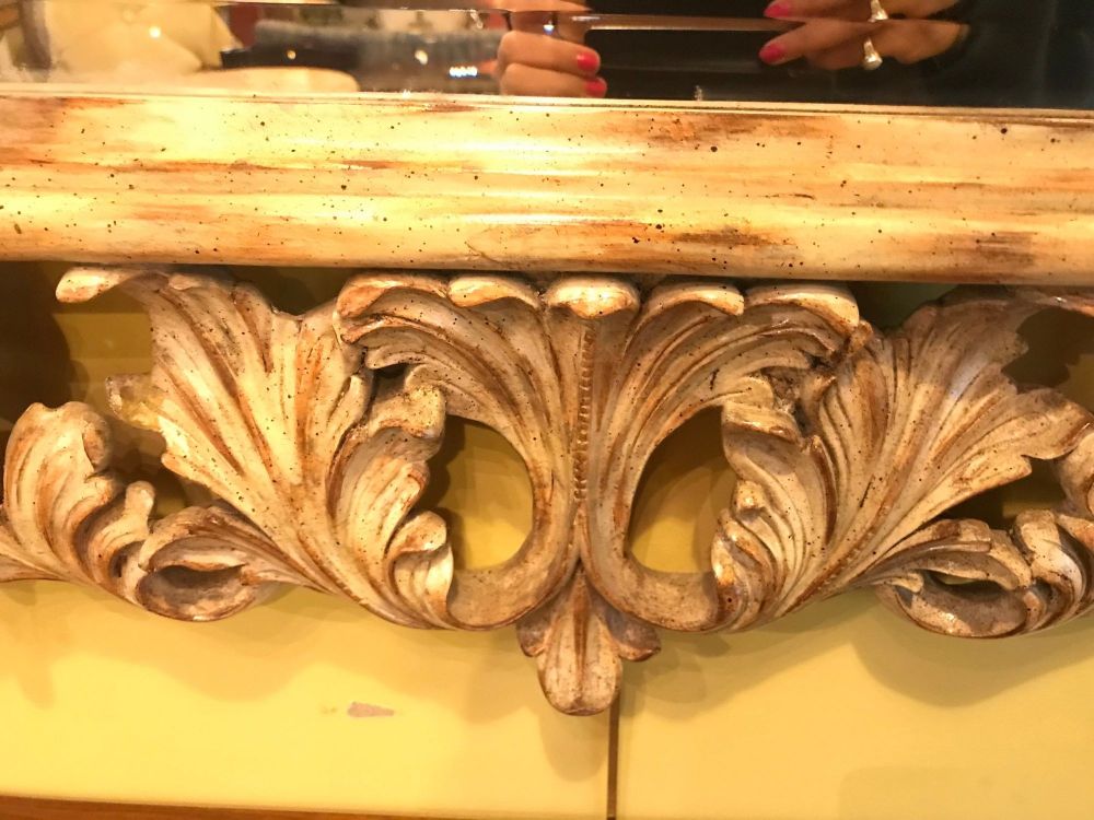 Heavily Carved French Frame Flanking a Bevelled Glass Wall or Console Mirror