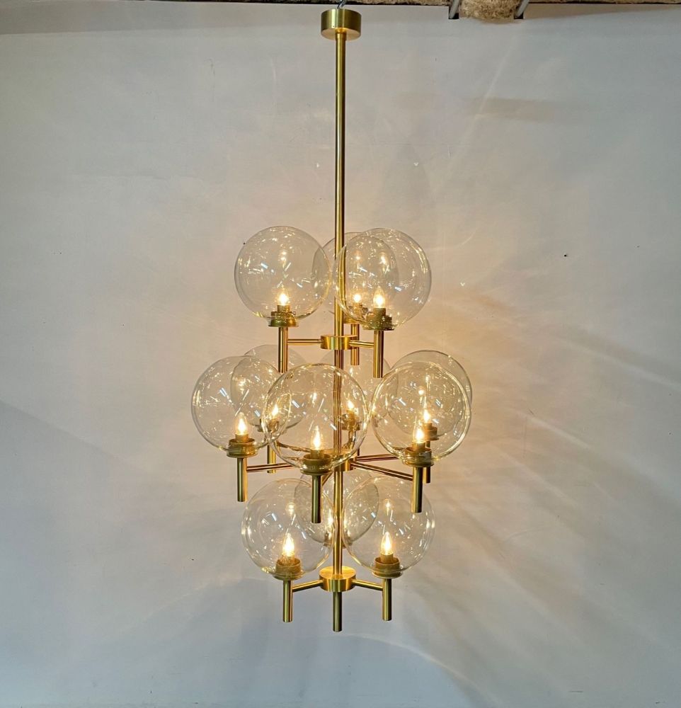 Pair of Monumental Mid-Century Modern Style Chandeliers in Amber Glass and Brass