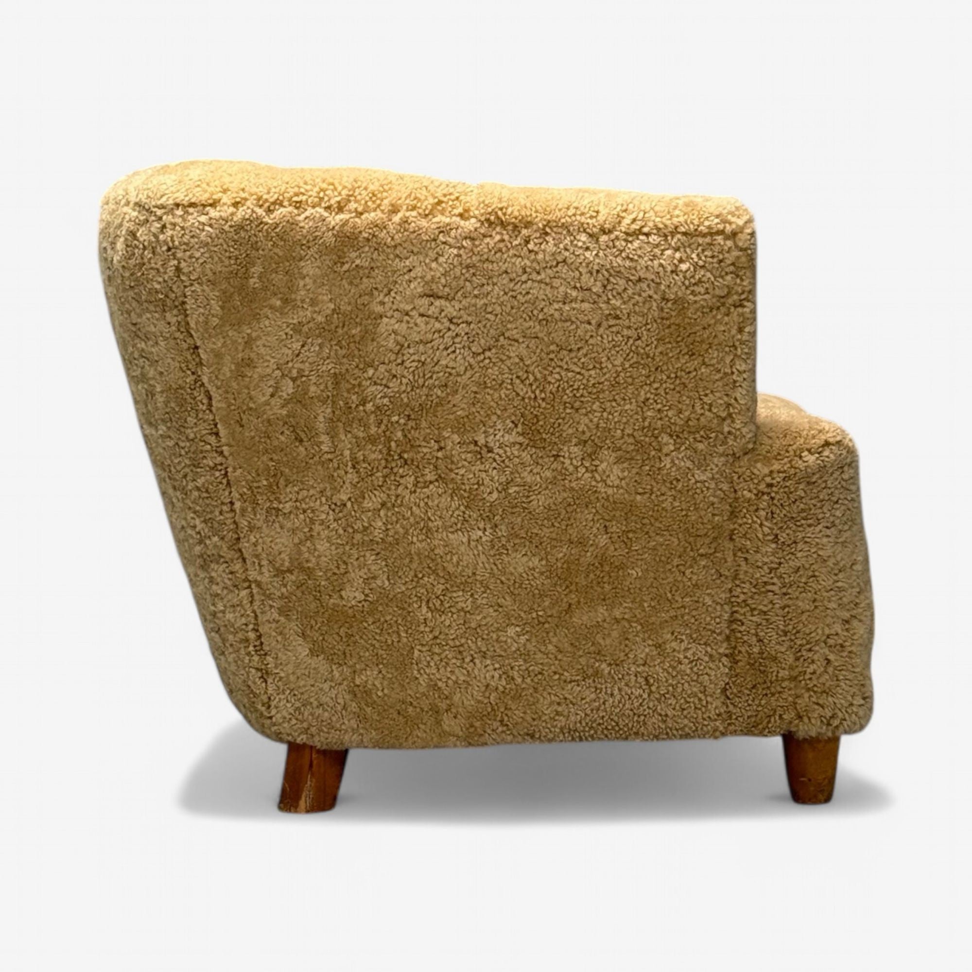 Danish Cabinetmaker, Banana Lounge Chair, Honey Sheepskin, Denmark, 1940s